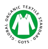 Ein grün-weißes kreisförmiges Logo mit einem stilisierten Hemd in der Mitte und den Worten „Global Organic Textile Standard GOTS“ am Rand.